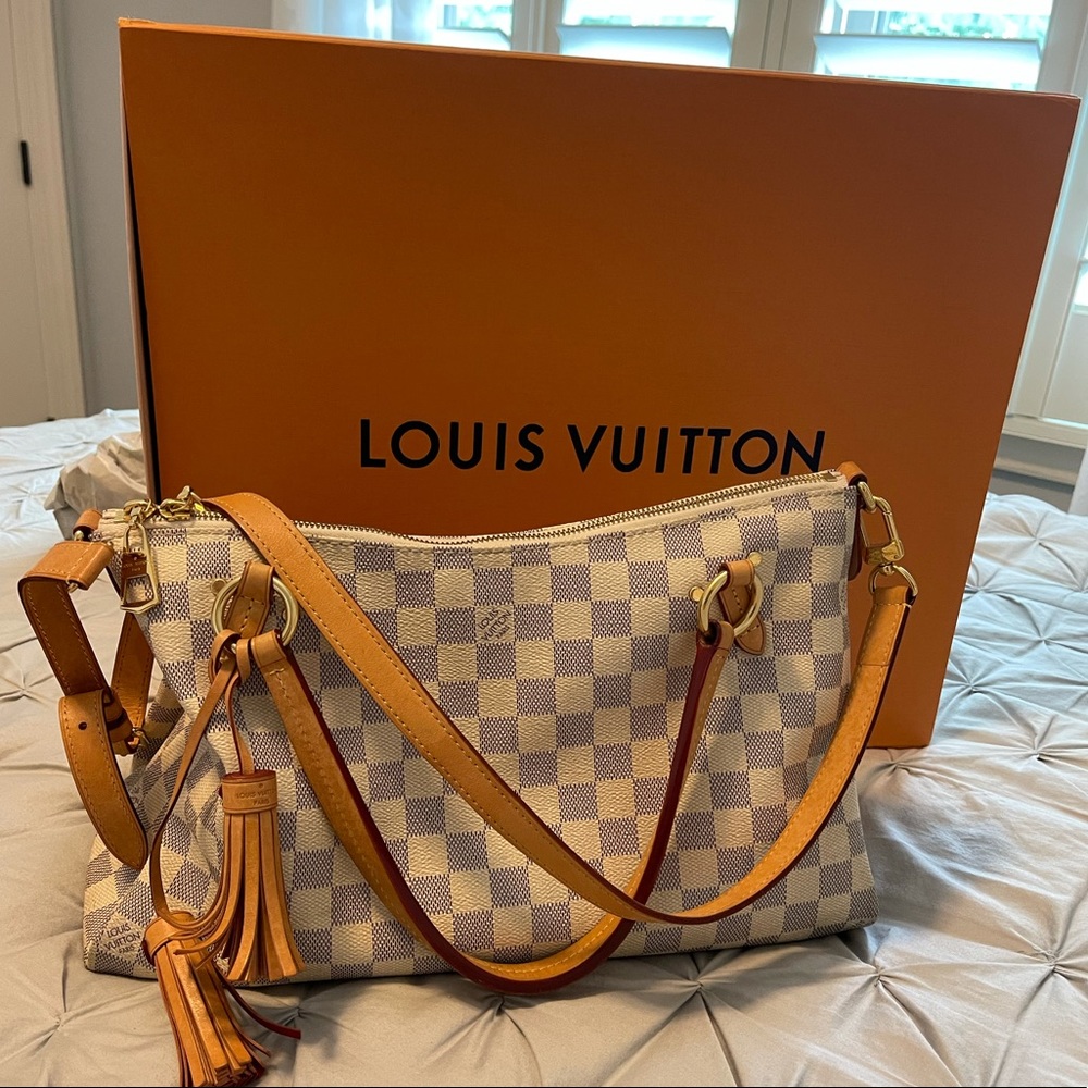 Louis Vuitton Lymington purse.
